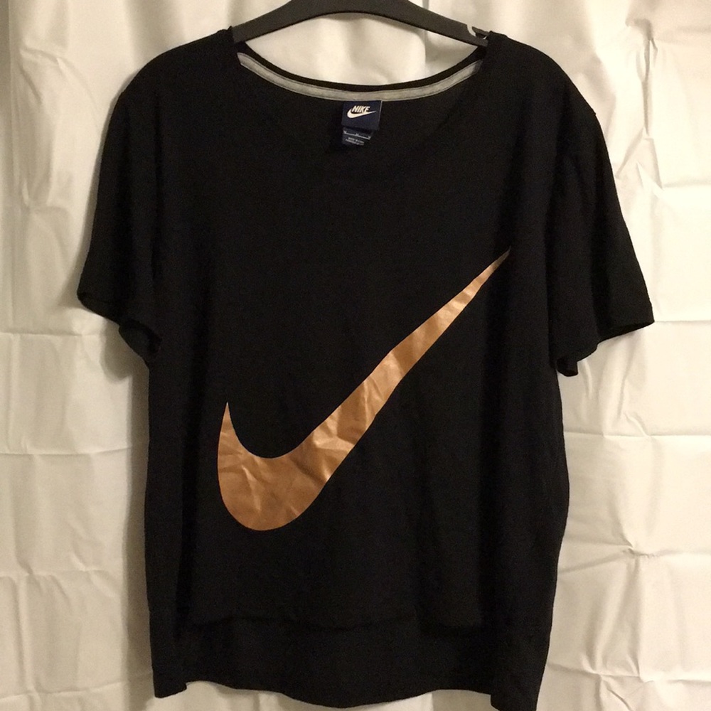 Nike - gold swoosh